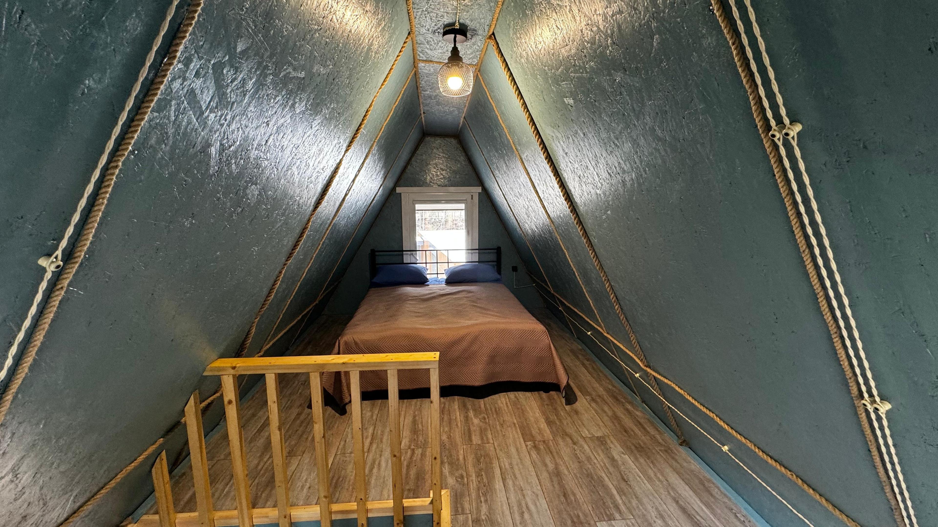 Двухэтажный коттедж A-frame